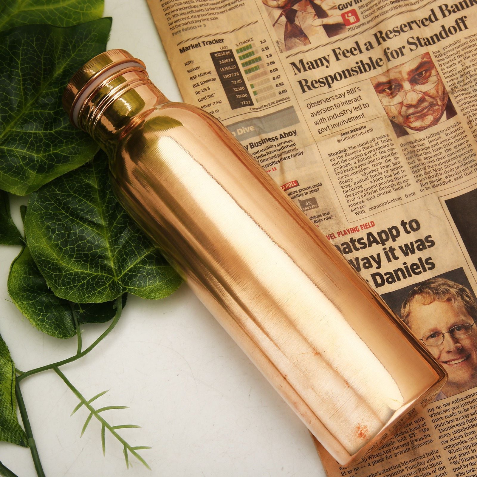 https://theh2obottles.com/cdn/shop/products/handmade-pure-copper-thermos-travel-water-bottle-ayurveda-copper-vessel-hammered-smooth-34-oz-8_1024x1024@2x.jpg?v=1581970375
