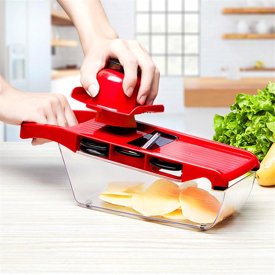 https://theh2obottles.com/cdn/shop/products/multi-function-6-in-1-vegetable-cutter-mandoline-slicer-with-interchangeable-stainless-steel-blades-7_1024x1024@2x.jpg?v=1622288846